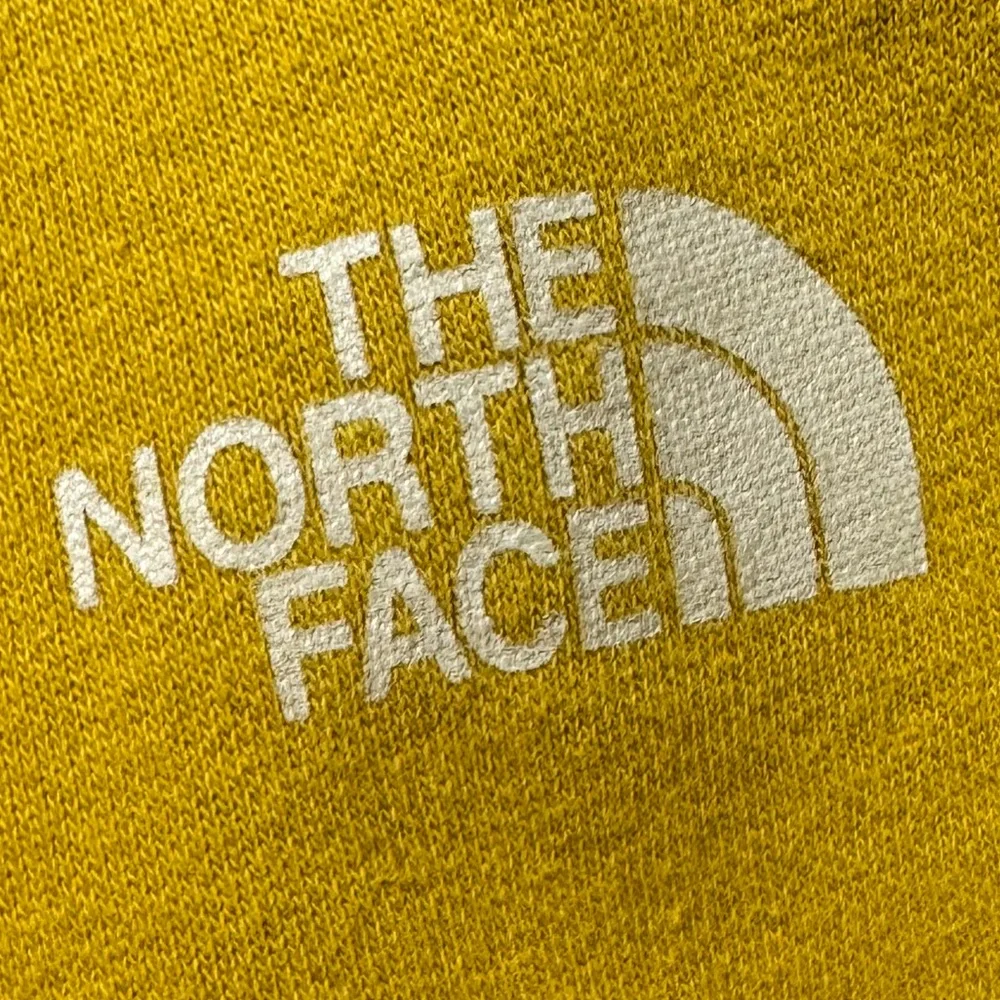 The North Face golden moss